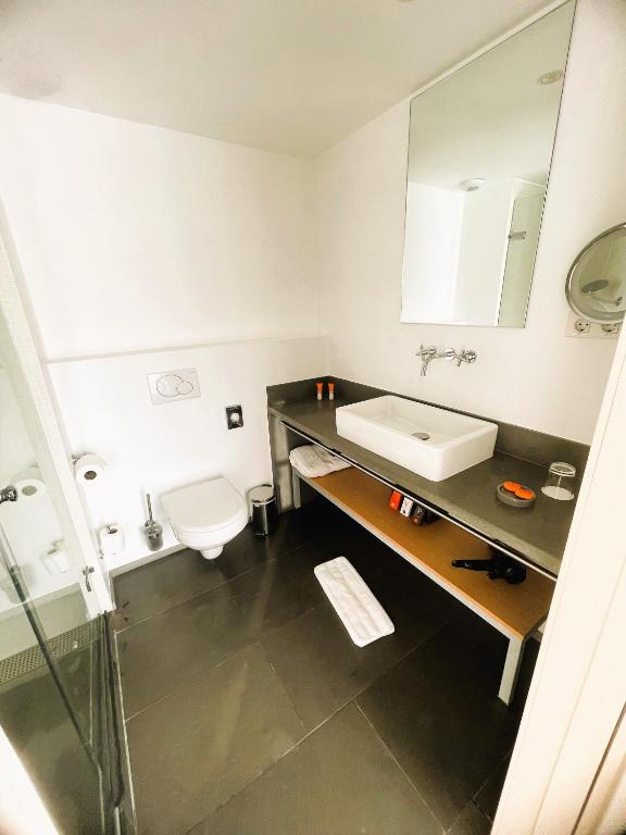 Koupelna v ubytování Hotel Alzinn