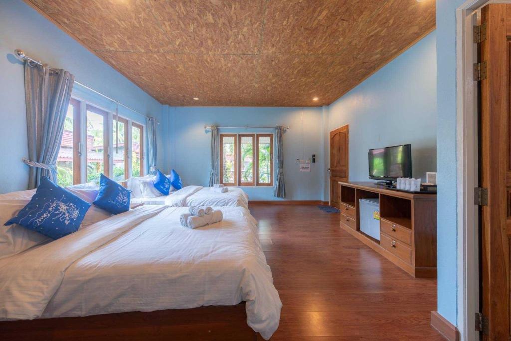 Postel nebo postele na pokoji v ubytování Seafar Resort