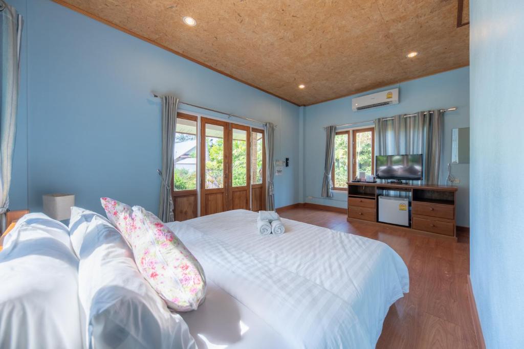 Postel nebo postele na pokoji v ubytování Seafar Resort