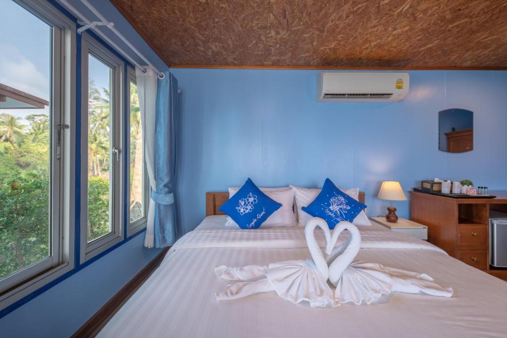Postel nebo postele na pokoji v ubytování Seafar Resort