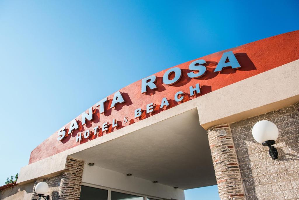 una señal en la parte delantera de un hospital en Santa Rosa Hotel & Beach, en Alexandroupoli