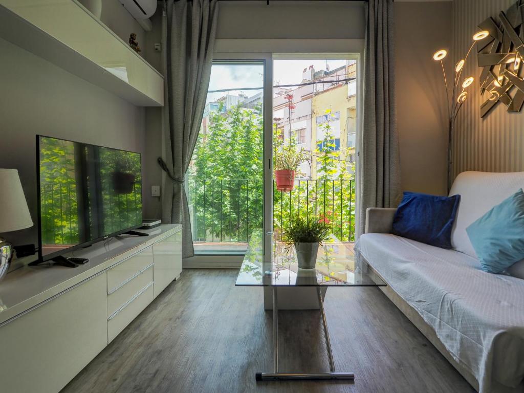 Posteľ alebo postele v izbe v ubytovaní Pura Vida Apartment by Hello Homes Sitges