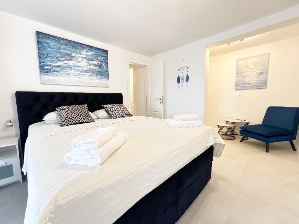 Postel nebo postele na pokoji v ubytování Apartments Larus