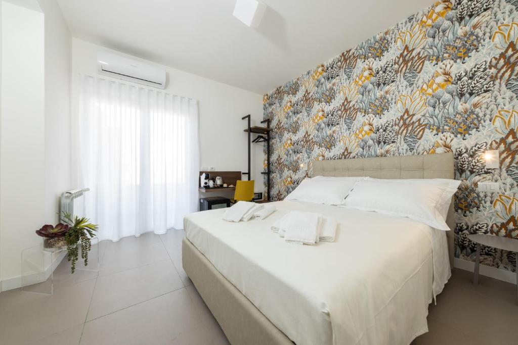 Postel nebo postele na pokoji v ubytování Sant’Agata Relais