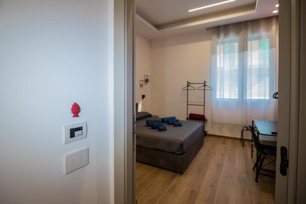 Postel nebo postele na pokoji v ubytování Maison La Lumia