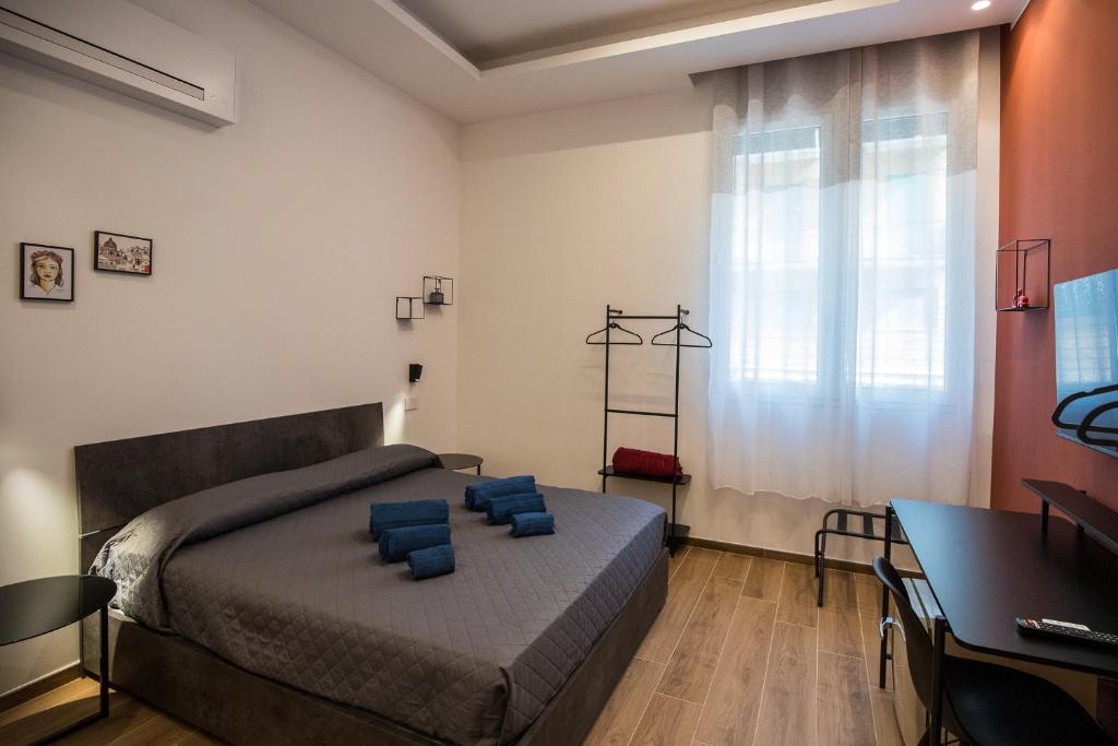 Postel nebo postele na pokoji v ubytování Maison La Lumia