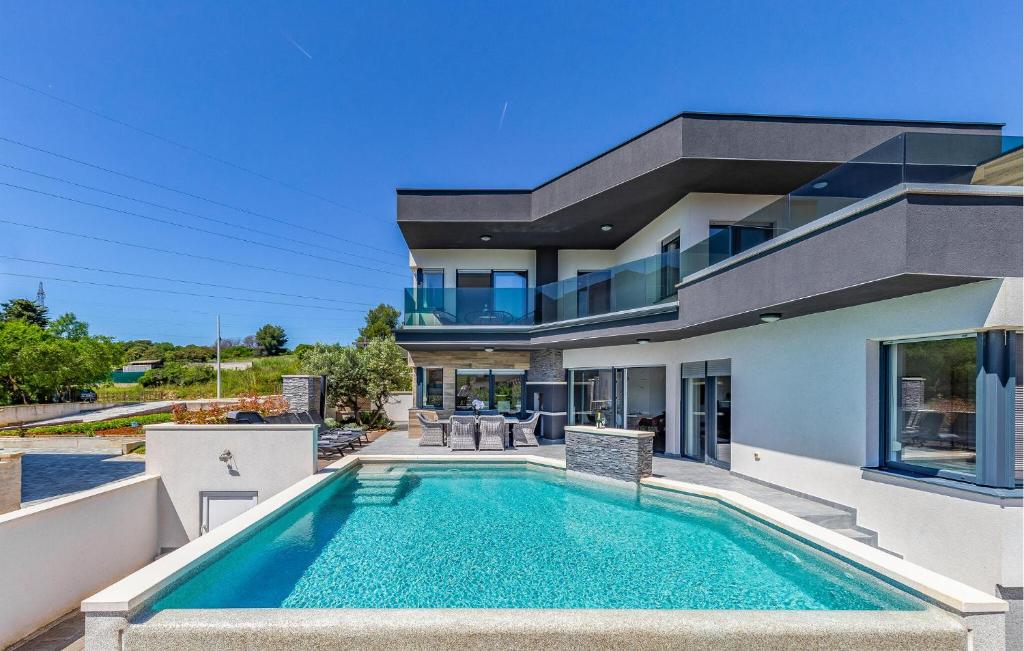 an image of a house with a swimming pool at Stunning Home In Pula in Pula