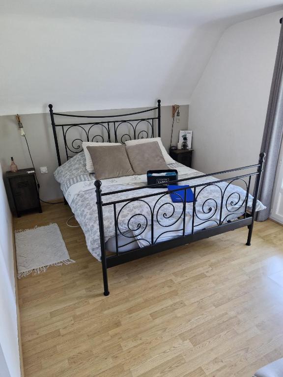 Кровать или кровати в номере Chambre d'hôte proche d'Étretat