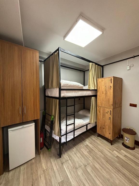 Postel nebo postele na pokoji v ubytování Moon Hostel