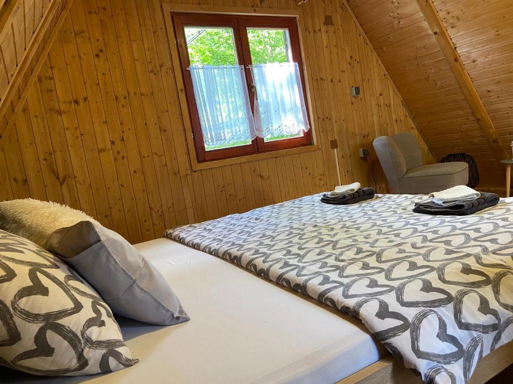 Ένα ή περισσότερα κρεβάτια σε δωμάτιο στο Kuća za odmor "Med Strmci"