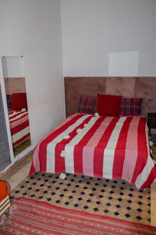 Postel nebo postele na pokoji v ubytování Riad Darko