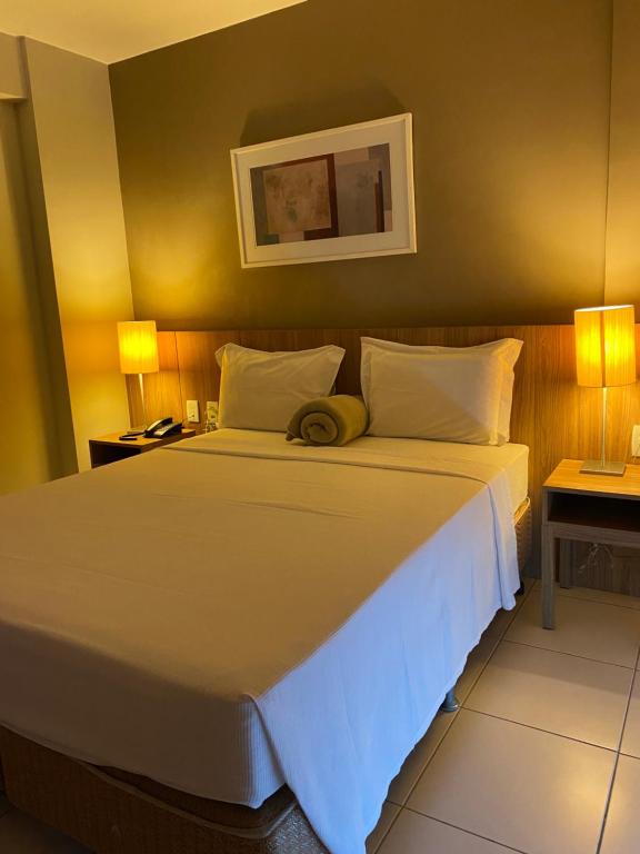 Giường trong phòng chung tại RioCentro RioStay - Flat - Apart Hotel - Parque Olímpico - Cidade do Rock