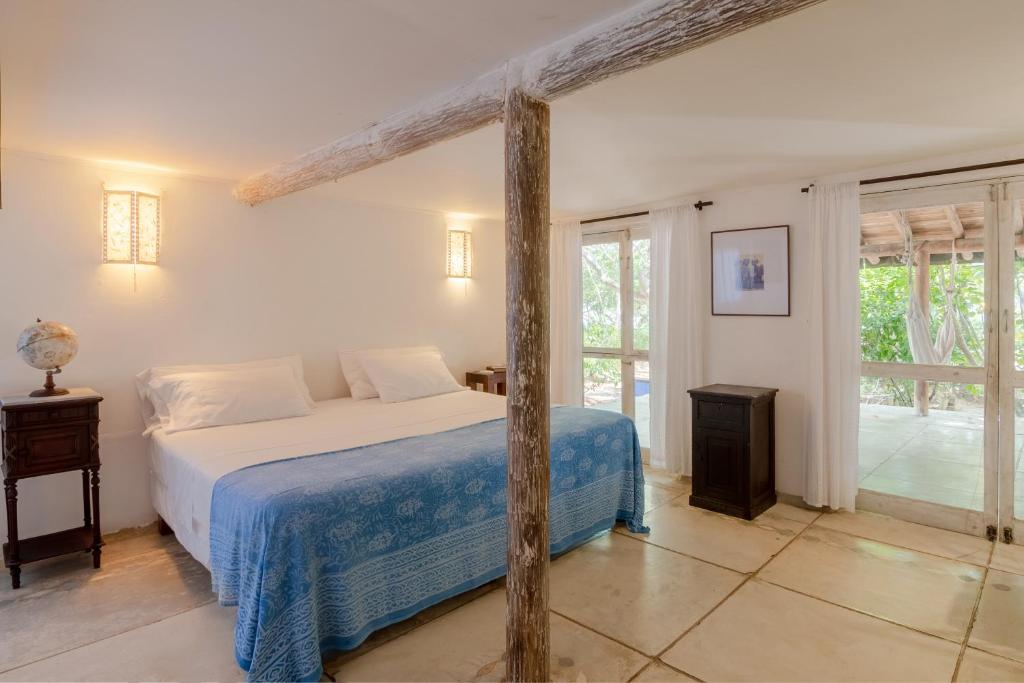 Postel nebo postele na pokoji v ubytování Hotel Playa Manglares Isla Baru