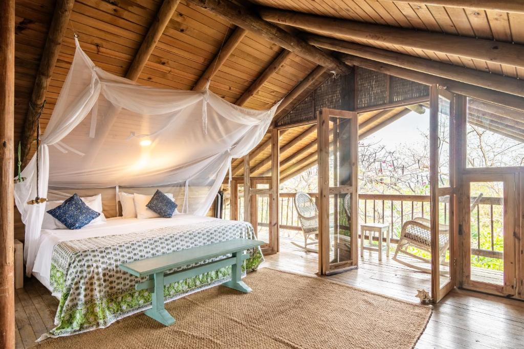 Postel nebo postele na pokoji v ubytování Hotel Playa Manglares Isla Baru