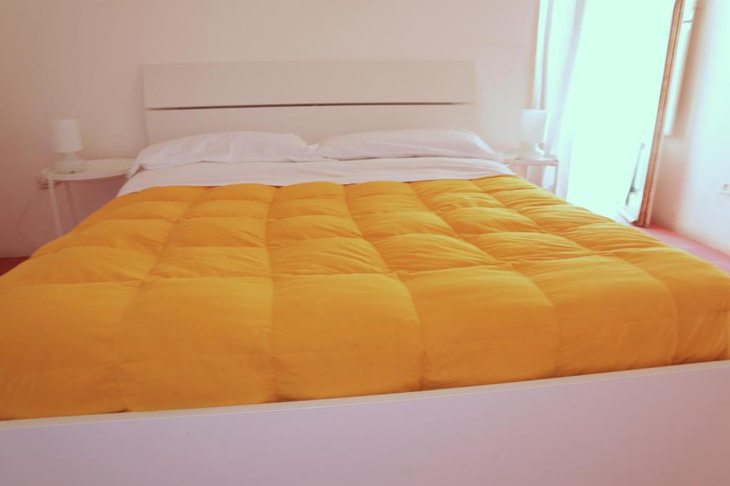 Krevet ili kreveti u jedinici u okviru objekta La casa sul porto - Marina Grande port