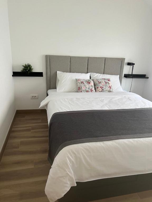 Postel nebo postele na pokoji v ubytování Apartment Magnolia gallery
