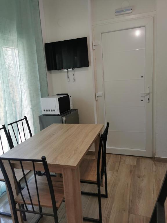 TV a/nebo společenská místnost v ubytování IRINI'S HOUSE