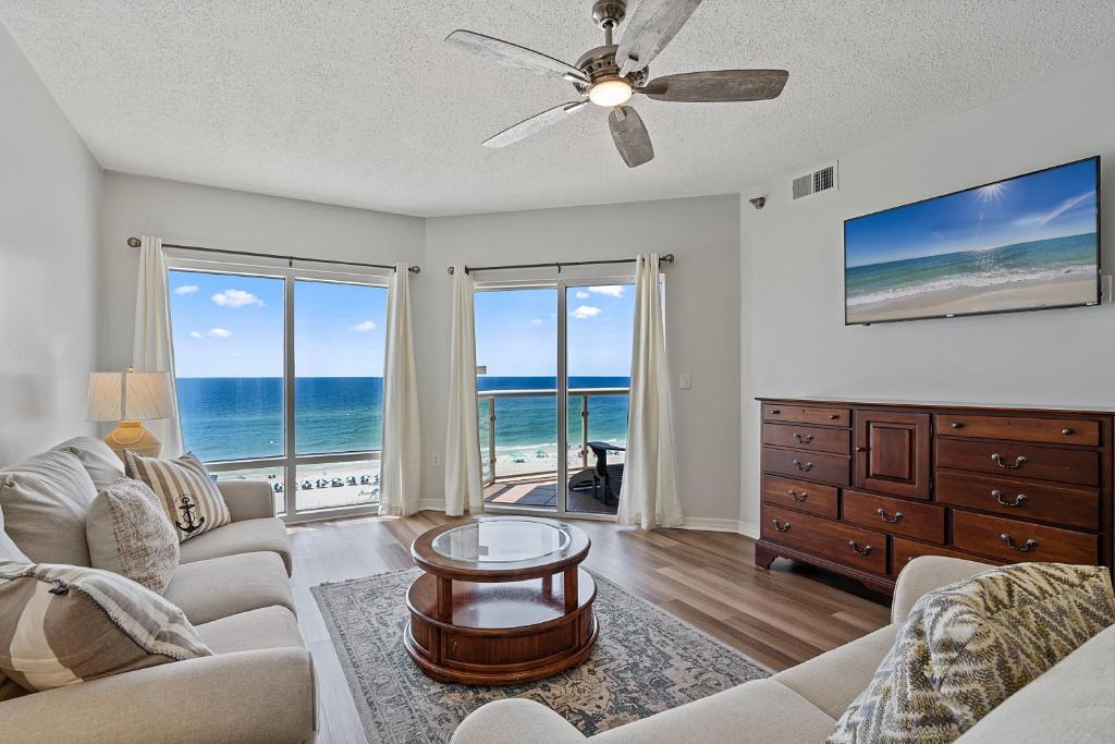 a living room with a view of the ocean at Emerald Isle Unit 607 in Pensacola Beach