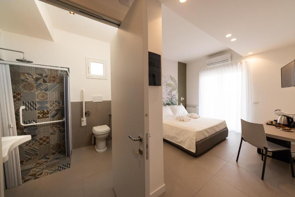 Postel nebo postele na pokoji v ubytování Sant’Agata Relais