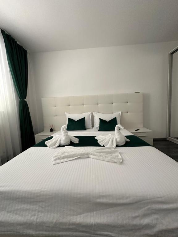Posteľ alebo postele v izbe v ubytovaní TopSpace
