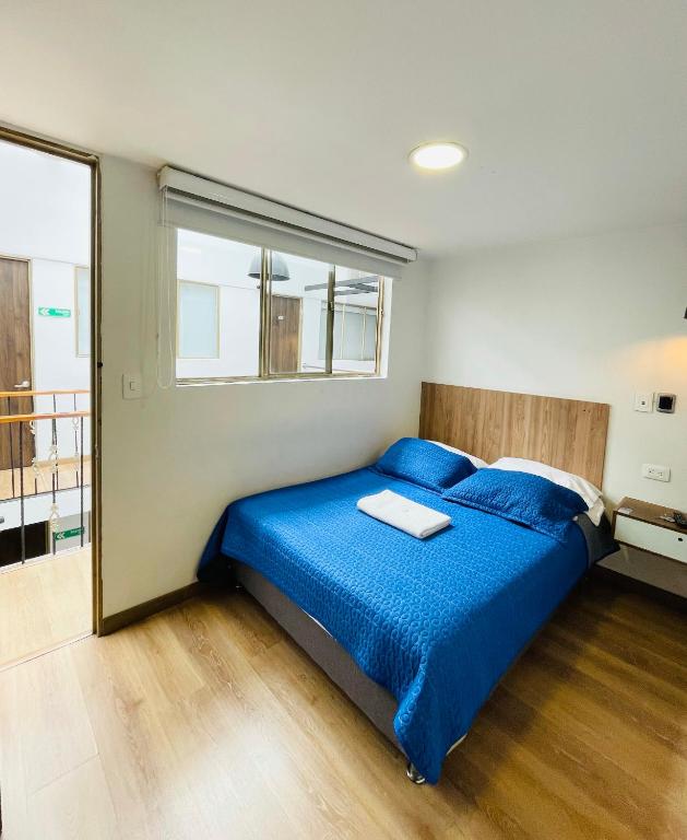 Postel nebo postele na pokoji v ubytování Hotel Botaniko