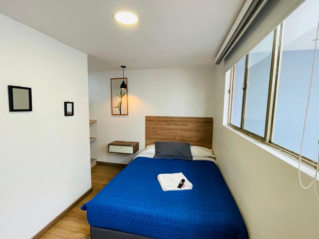 Postel nebo postele na pokoji v ubytování Hotel Botaniko