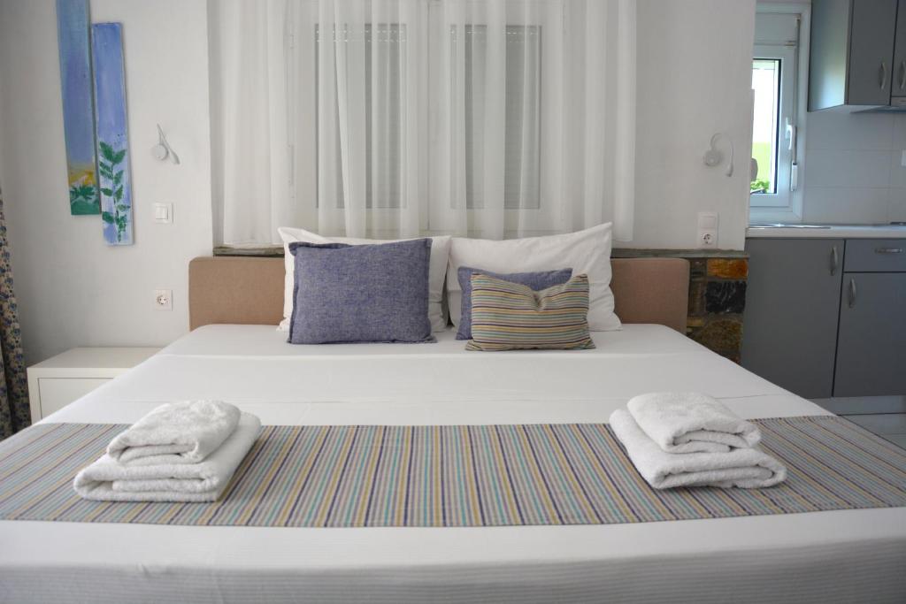 Posteľ alebo postele v izbe v ubytovaní Virginia Rooms