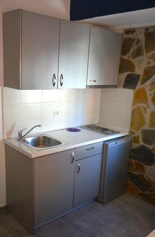 Kuchyňa alebo kuchynka v ubytovaní Virginia Rooms