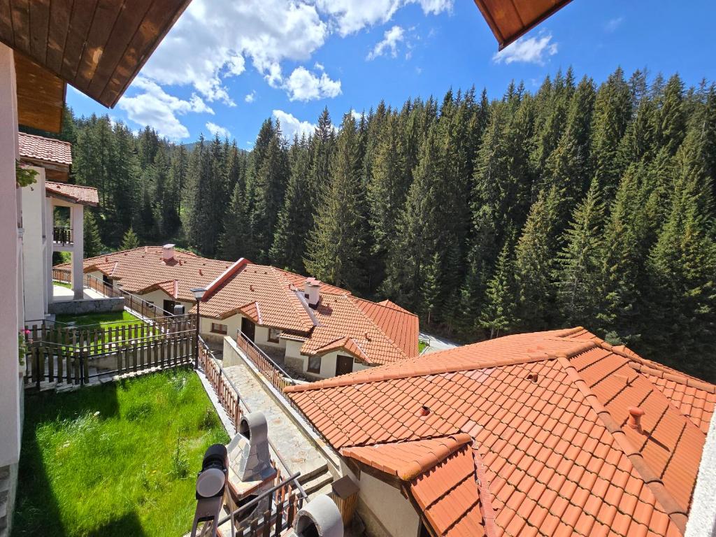 an aerial view of a house with trees at Вила 5 - Планински перли in Stoykite