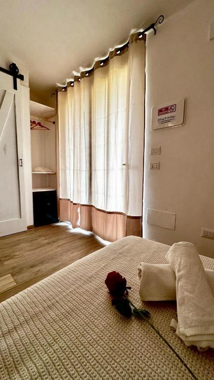 Postel nebo postele na pokoji v ubytování Dimora Idruntina