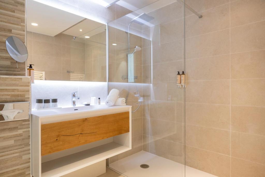 Ванная комната в Hotel La Garbine