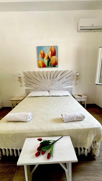 Postel nebo postele na pokoji v ubytování Dimora Idruntina