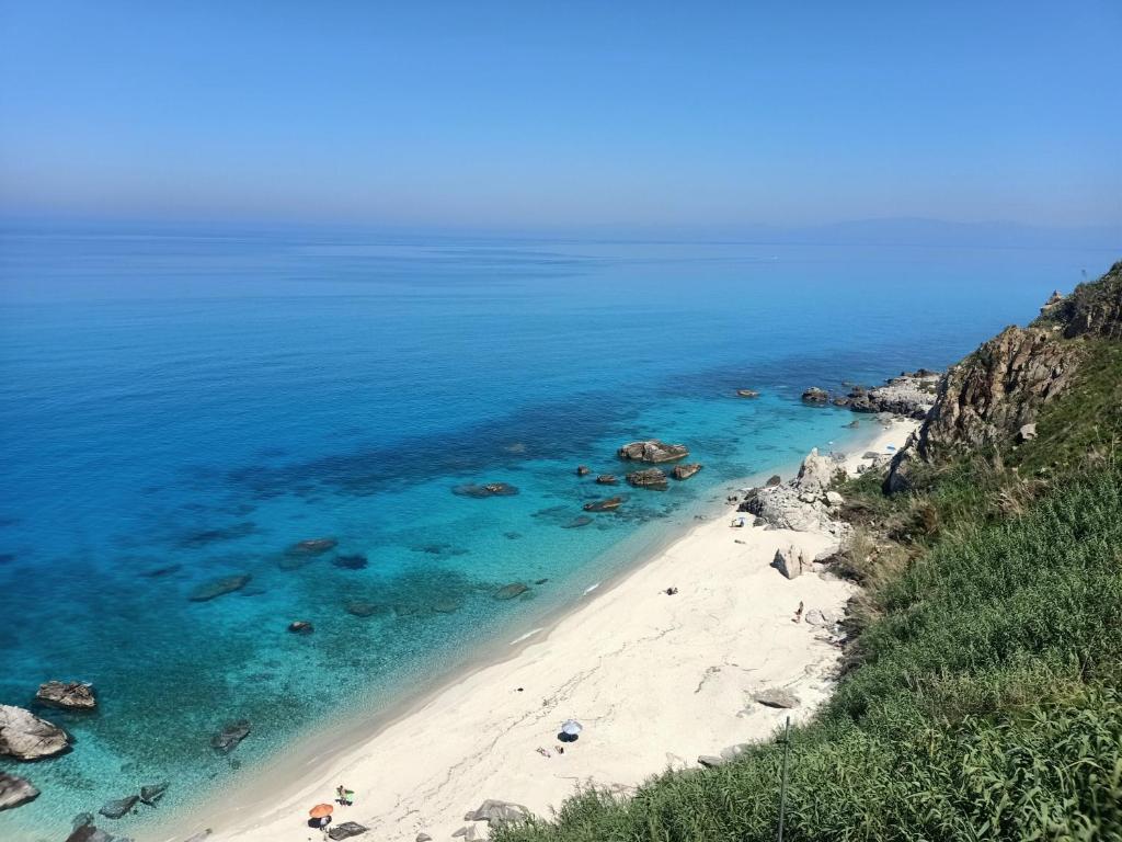 an aerial view of a beach in the ocean at Sunny House in Parghelia
