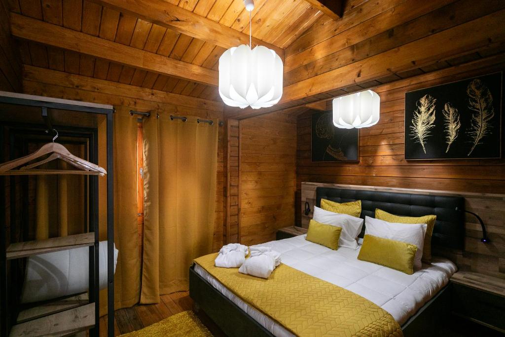 Postel nebo postele na pokoji v ubytování Adega da Quinta -Casa da Pipas
