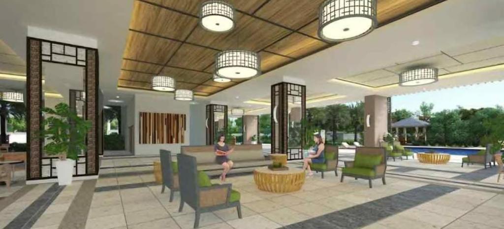 a rendering of a lobby with two people running at Casa Concha by Celandine private residences in Manila