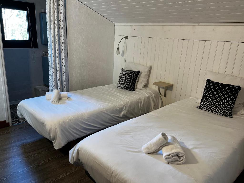 Postel nebo postele na pokoji v ubytování Hotel Cote et Lac