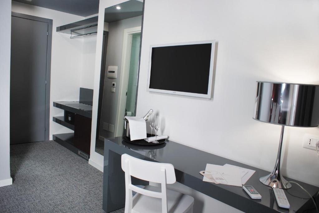 TV a/nebo společenská místnost v ubytování Hotel Leopardi