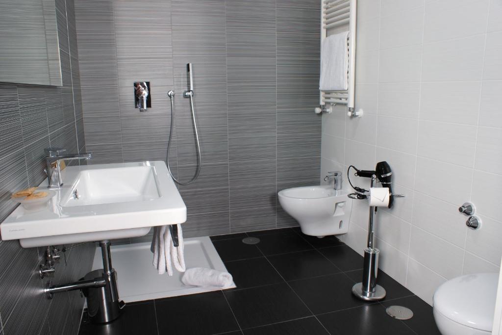 Koupelna v ubytování Hotel Leopardi