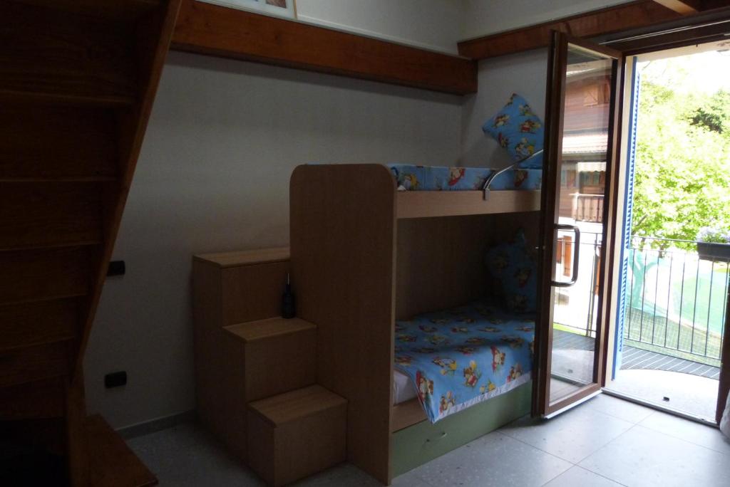 Postel nebo postele na pokoji v ubytování Giardino tra i laghi