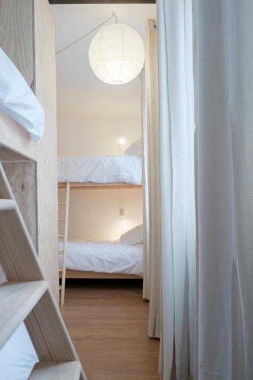 Postel nebo postele na pokoji v ubytování Casa Champgil