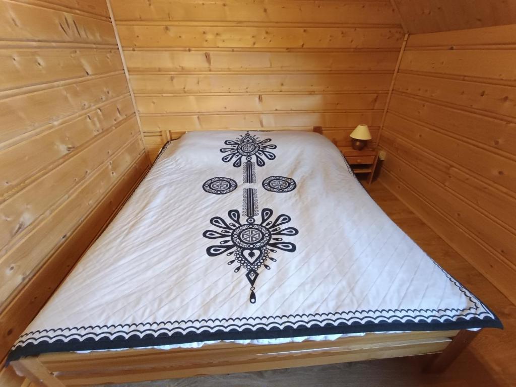 Posteľ alebo postele v izbe v ubytovaní Dom goralski Kamilux