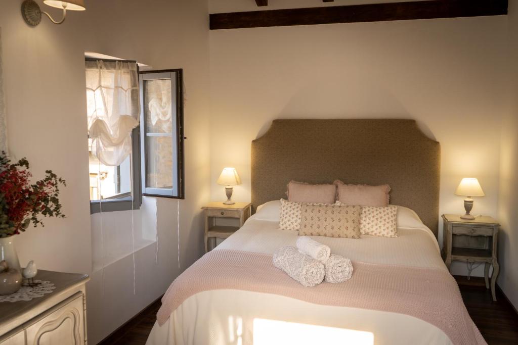 En eller flere senge i et værelse på La Esencia