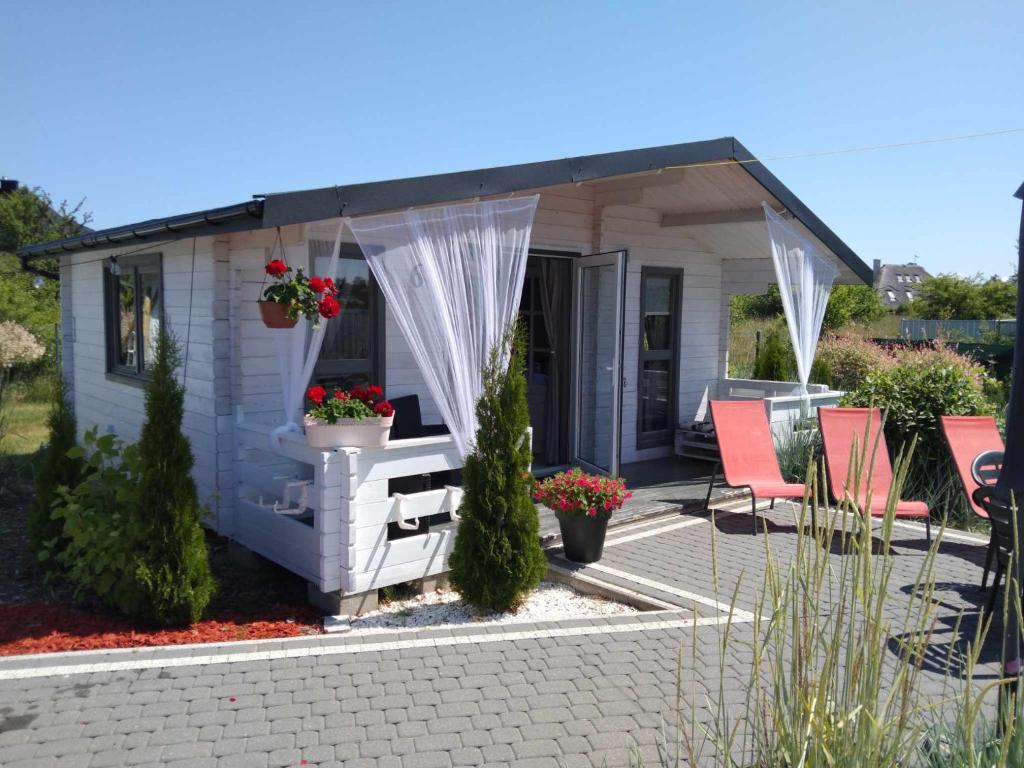 Zahrada ubytování Domki LA MER z własnymi ogródkami- Balia z jacuzzi ,sauna ,rowery, klimatyzacja