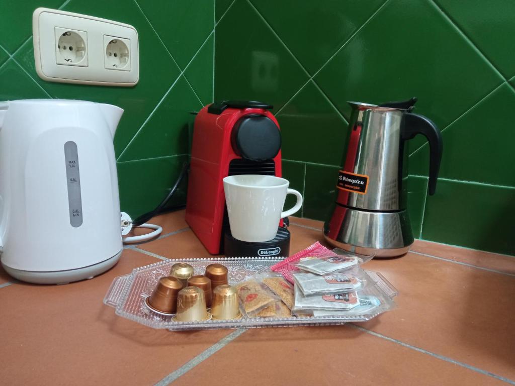Príslušenstvo na prípravu kávy alebo čaju v ubytovaní Casita en el centro