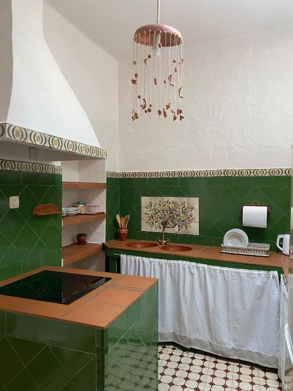 Kuchyňa alebo kuchynka v ubytovaní Casita en el centro
