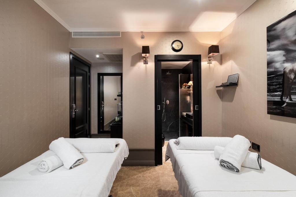 Postel nebo postele na pokoji v ubytování Hotel B Berdichevsky