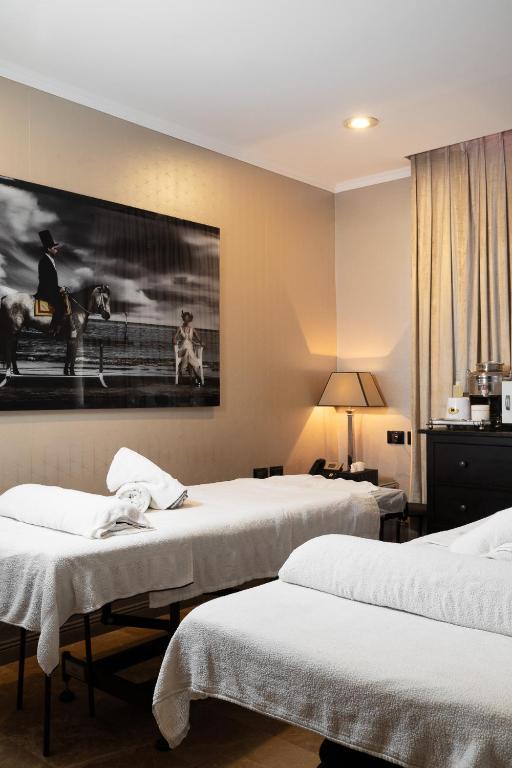 Postel nebo postele na pokoji v ubytování Hotel B Berdichevsky