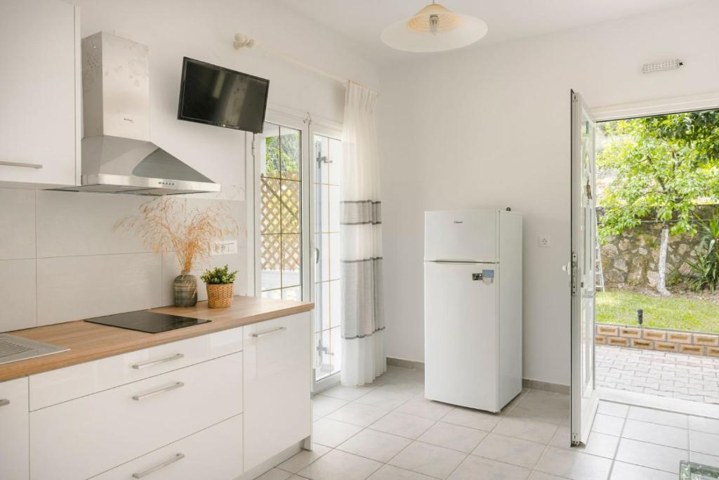 Kuchyň nebo kuchyňský kout v ubytování Vivian Apartments