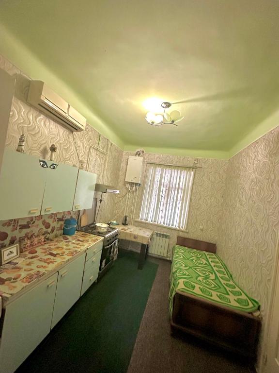 Kuchyň nebo kuchyňský kout v ubytování NunSon Guest House