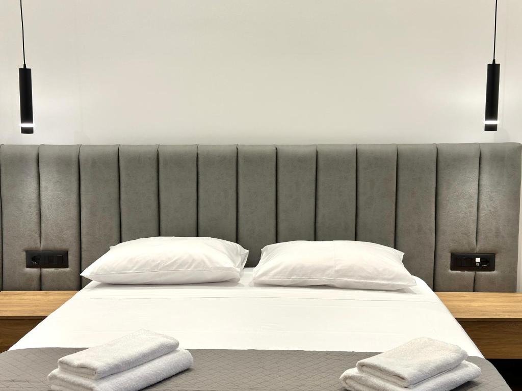 Postel nebo postele na pokoji v ubytování Keos Hotel